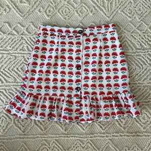White skirt with red floral print from brand Miami -size small -lightly worn